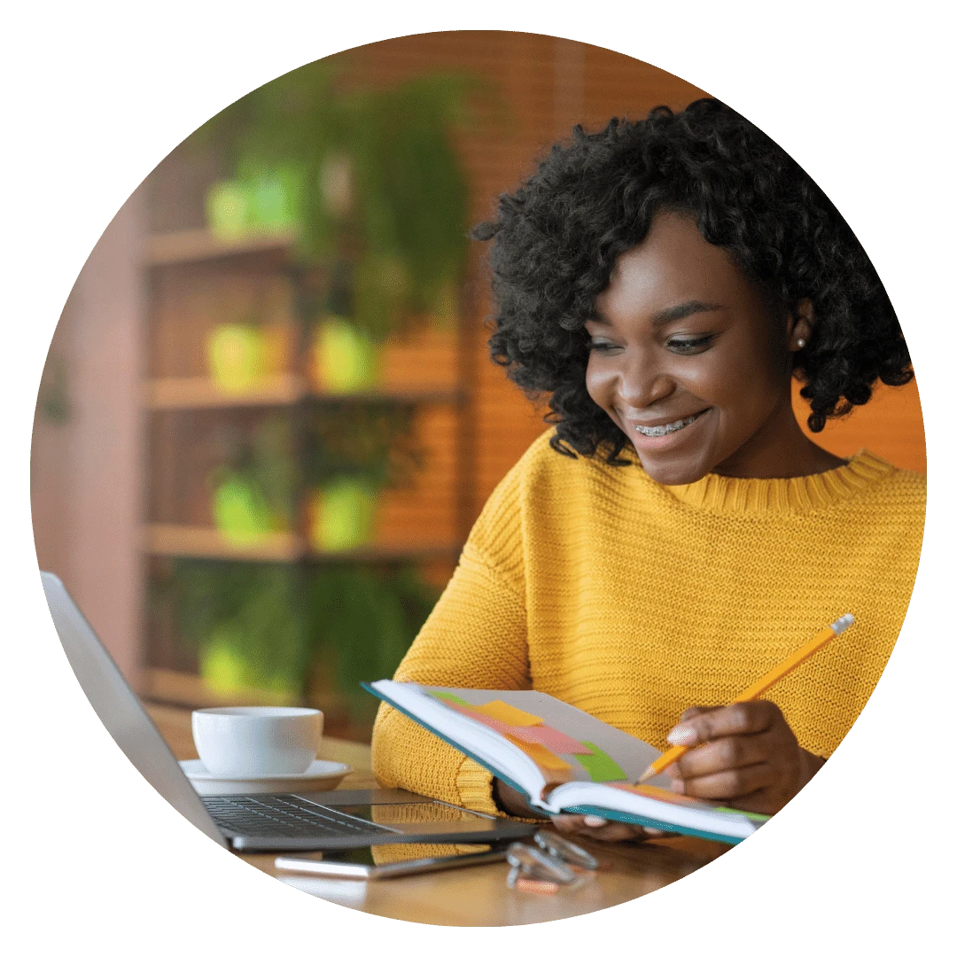 BIPOC Therapist student studying.