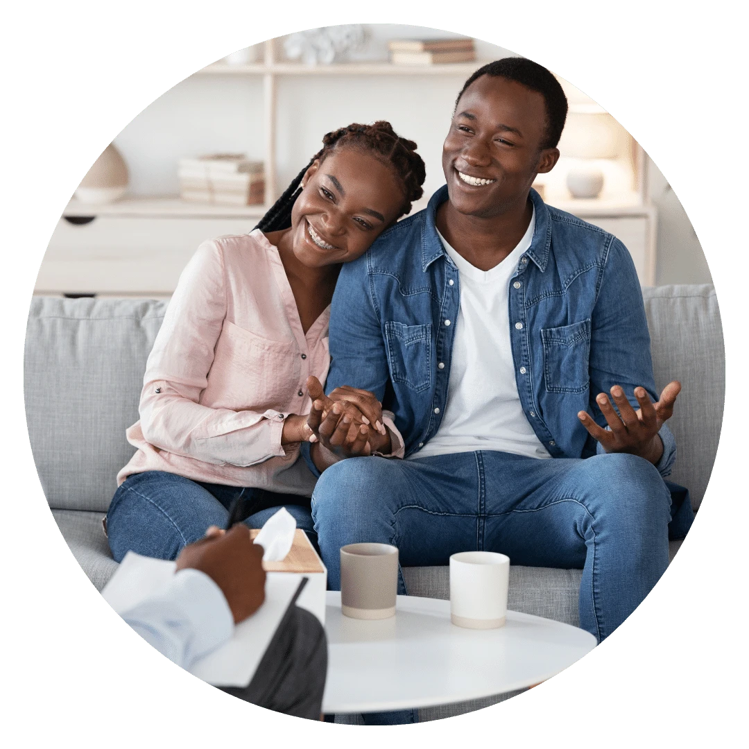 A couple having a communication and counselling workshop to improve their relationship.